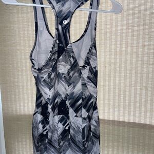 two women’s workout tank tops